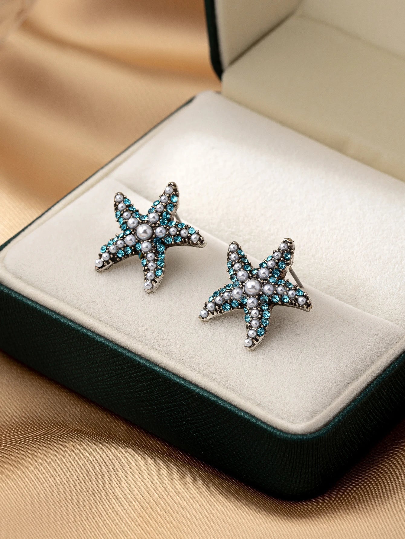 עגילים דגם ים